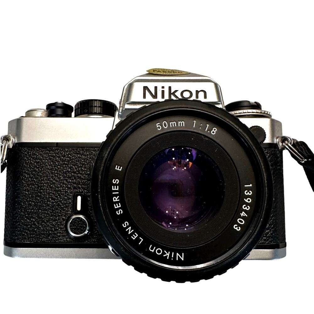 Nikon FM 35mm SLR Film Camera with Nikon Series E 150mm 1.8 Lens